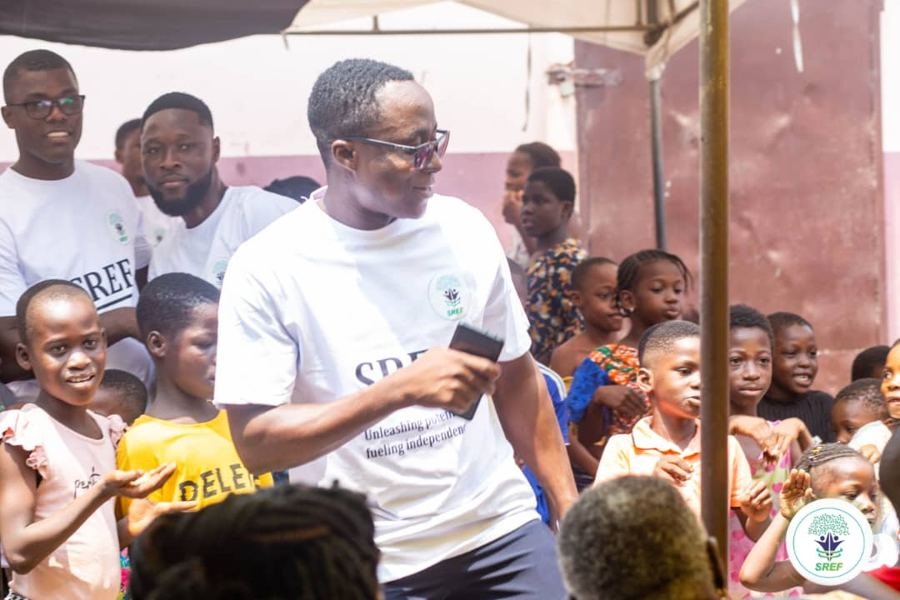 Students supported by SREF gathered at a community event in Ghana