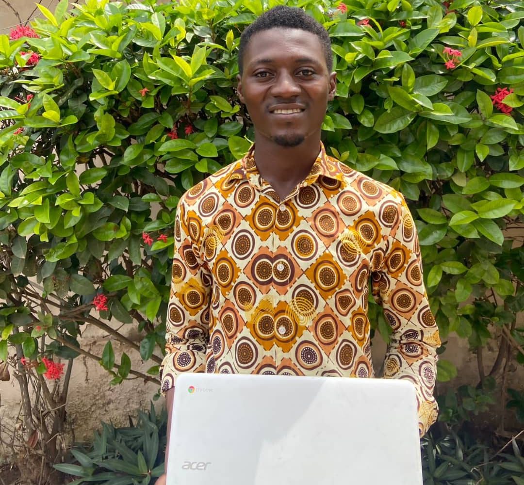 SREF laptop handoff — recipient with his new Acer laptop